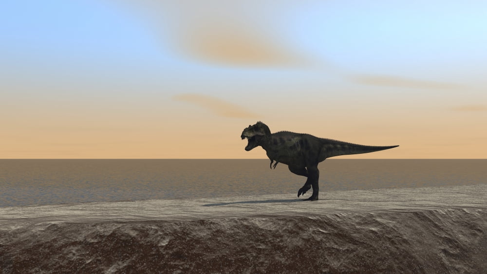 Tyrannosaurus Rex hunting along the shoreline Canvas Art - Kostyantyn IvanyshenStocktrek Images (38 x 22)