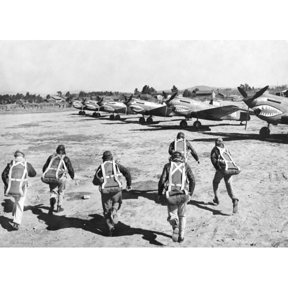 U.S. Flying Tiger Pilots Run To Their Fighter Planes At An Advanced U.S. Base In China. They Will Pursue Japanese Bombers Conducting An Air Raid In Their Area. They Are U.S. Volunteers Recruited And