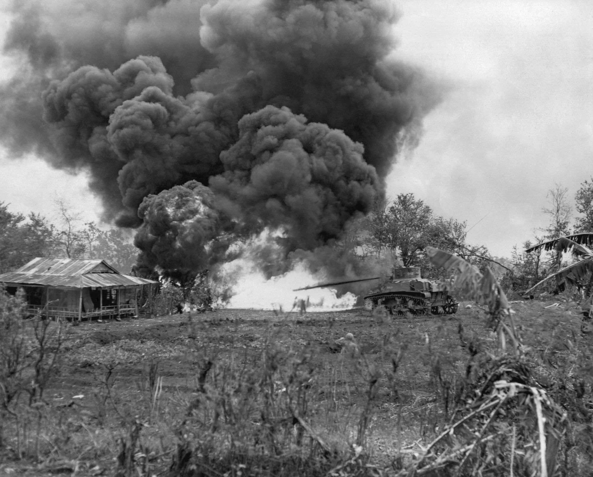 U.S. Marine FlameThrowing Tank Attacks A Japanese Pillbox On Saipan