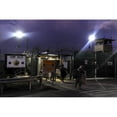 thumbnail image 1 of U.S. Soldiers Exit A Controlled Entryway After Completing Their 12-Hour Shifts At Camp Delta Guantanamo Bay Naval Base, 1 of 2