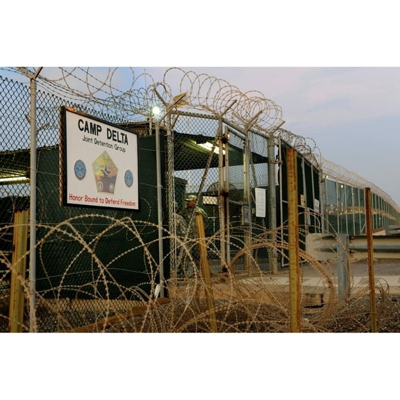 U.S. Soldiers Guard A Controlled Entryway At Camp Delta The Guantanamo Bay Military Prison At The Naval Base In Eastern