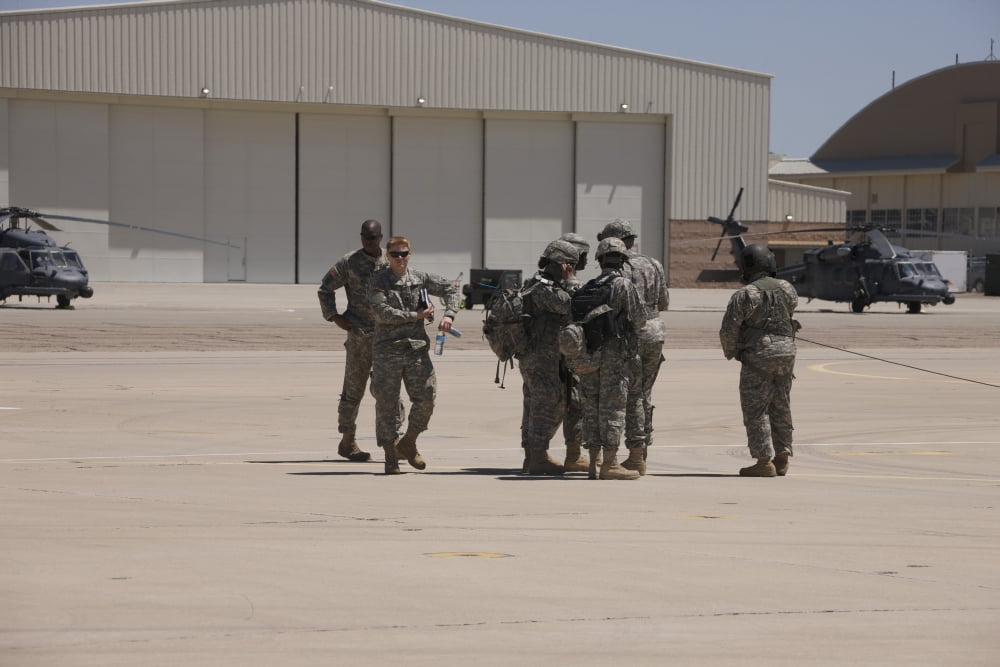 UH-60 Black Hawk aircrew conduct a preflight briefing Canvas Art - Terry MooreStocktrek Images (35 x 23)