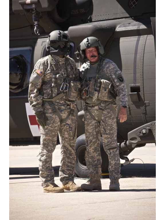 UH-60 Black Hawk crew chiefs Canvas Art - Terry MooreStocktrek Images (23 x 35)