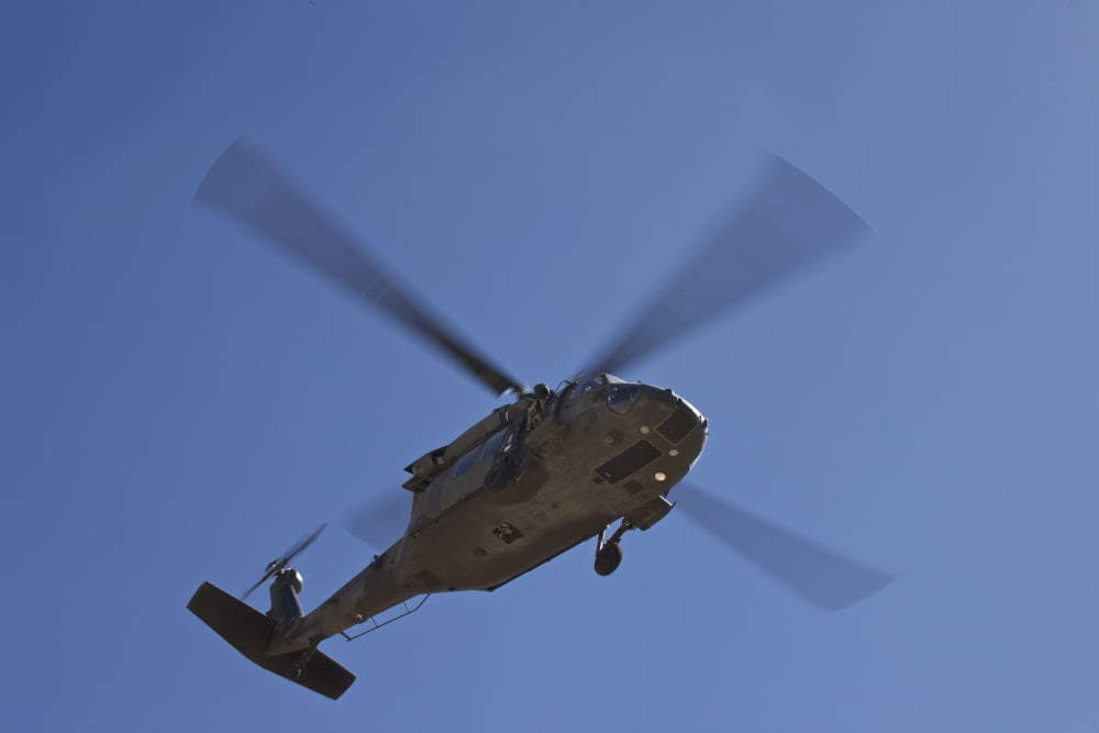 UH-60 Black Hawk helicopter flies overhead in New Mexico Canvas Art - Terry MooreStocktrek Images (35 x 23)