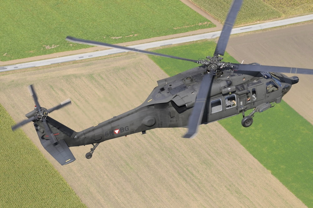 UH-60 Black Hawk helicopter of the Austrian Air Force in flight Canvas Art - Riccardo NiccoliStocktrek Images (34 x 23)
