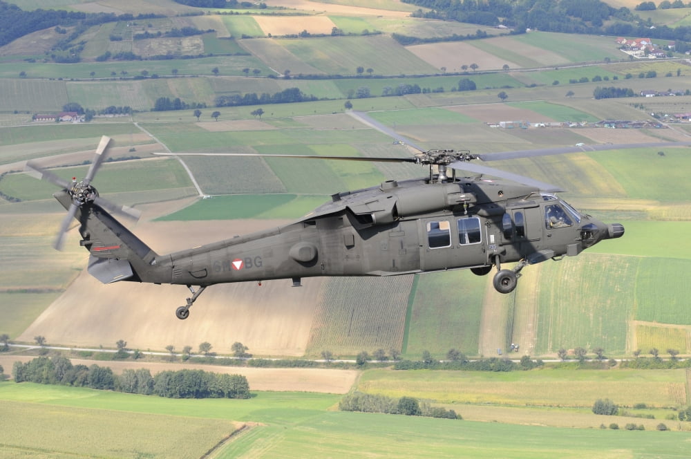 UH-60 Black Hawk helicopter of the Austrian Air Force in flight Canvas Art - Riccardo NiccoliStocktrek Images (34 x 23)