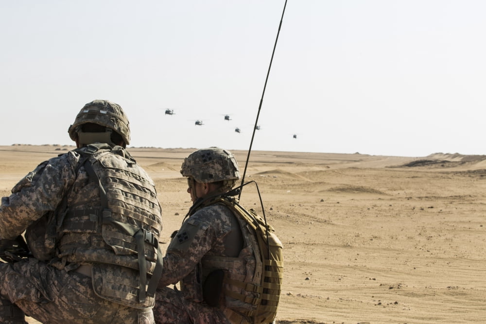 UH-60 Black Hawk helicopters prepare to airdrop soldiers in Kuwait Canvas Art - Stocktrek Images (34 x 23)