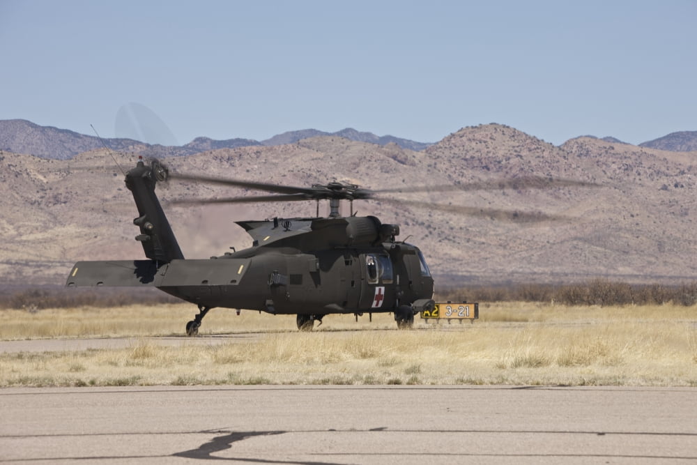 UH-60 Black Hawk takes off after refueling in New Mexico Canvas Art - Terry MooreStocktrek Images (35 x 23)