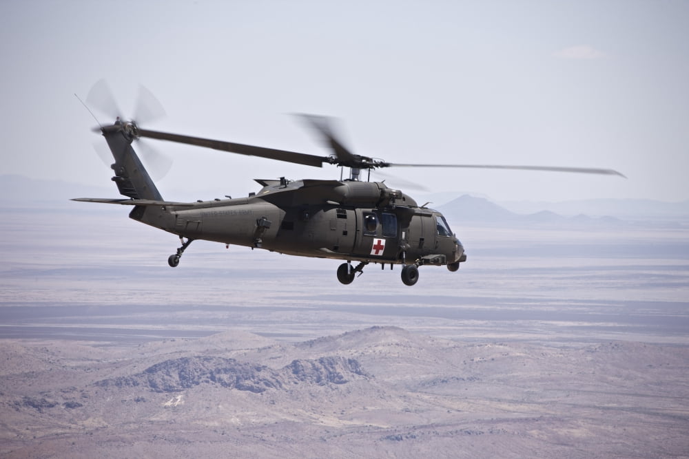 UH-60 Black Hawk takes off after refueling in New Mexico Canvas Art - Terry MooreStocktrek Images (35 x 23)