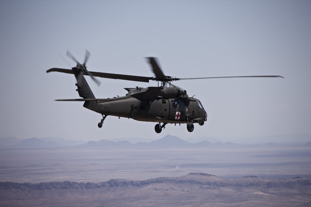UH-60 Black Hawk takes off after refueling in New Mexico Canvas Art - Terry MooreStocktrek Images (35 x 23)