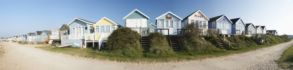 UK Panoramic view of beach huts Dorset Canvas Art - Adrian Brockwell Design Pics (43 x 10)