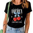 thumbnail image 1 of UNISHE Women's God Bless America 1776 Cherry Bow Patriotic Graphic Black Short Sleeve T-Shirt Casual Cotton Crewneck Top, 1 of 5