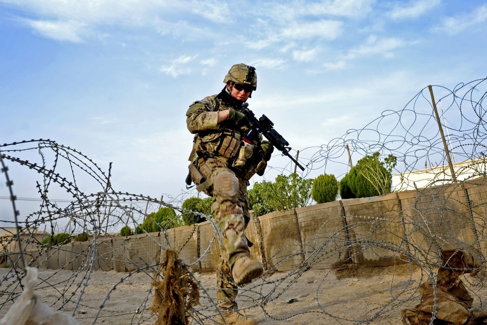 US Air Force Airman patrols through Qalat City Afghanistan Canvas Art - Stocktrek Images (35 x 23)