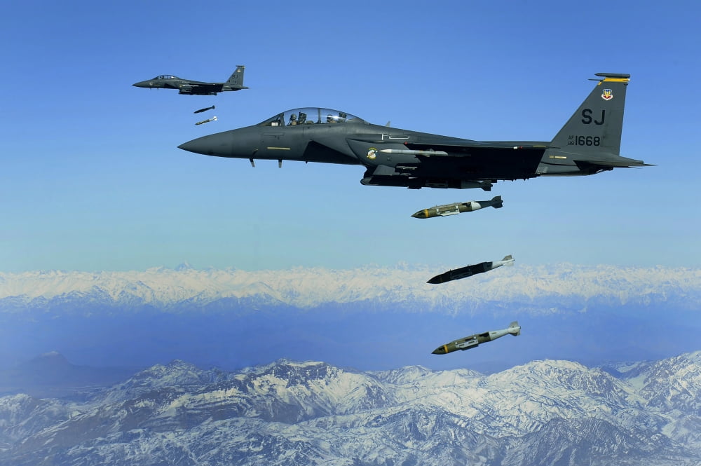 US Air Force F-15E Strike Eagle aircraft drops 2000-pound joint direct attack munitions Canvas Art - Stocktrek Images (34 x 23)