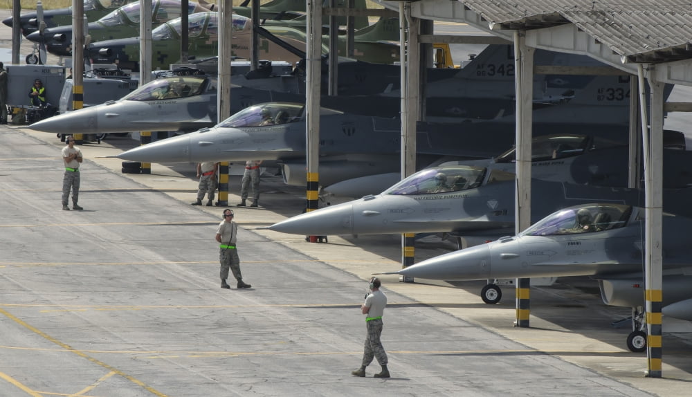US Air Force F-16 Fighting Falcons parked at Natal Air Force Base Brazil Canvas Art - Giovanni CollaStocktrek Images (37 x 22)
