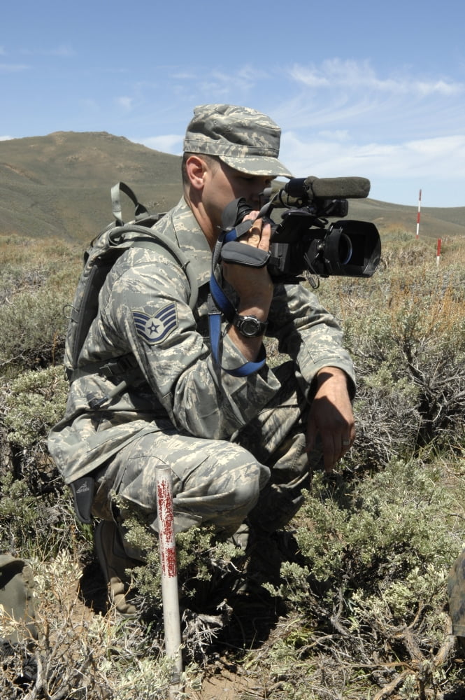 US Air Force Sergeant shoots video in the mountains Canvas Art - Stocktrek Images (23 x 34)