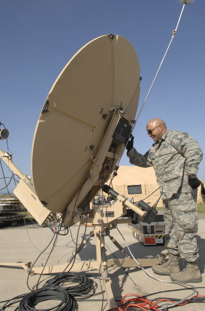 US Air Force Staff Sergeant assembles a satellite communications dish Canvas Art - Stocktrek Images (23 x 35)