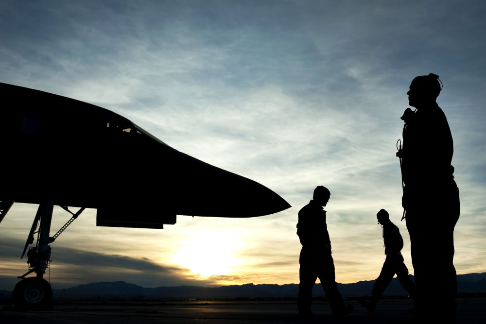 US Air Force airmen prepare for a B-1B Lancer to launch Canvas Art - Stocktrek Images (35 x 23)