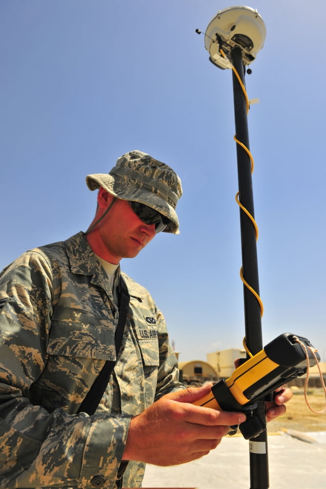 US Air Force engineer using global positioning system-based survey equipment Canvas Art - Stocktrek Images (23 x 35)