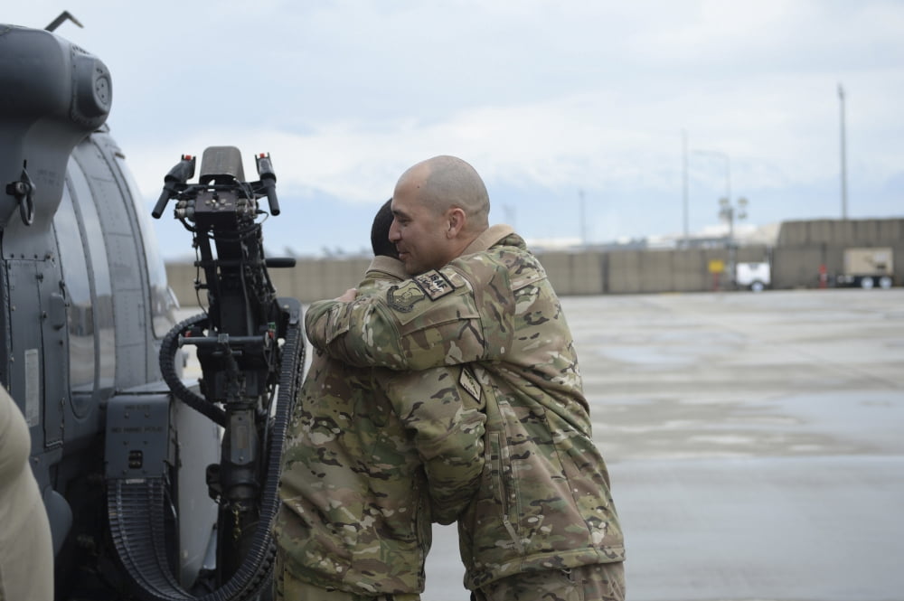 US Air Force flight engineer hugs his father Canvas Art - Stocktrek Images (34 x 23)