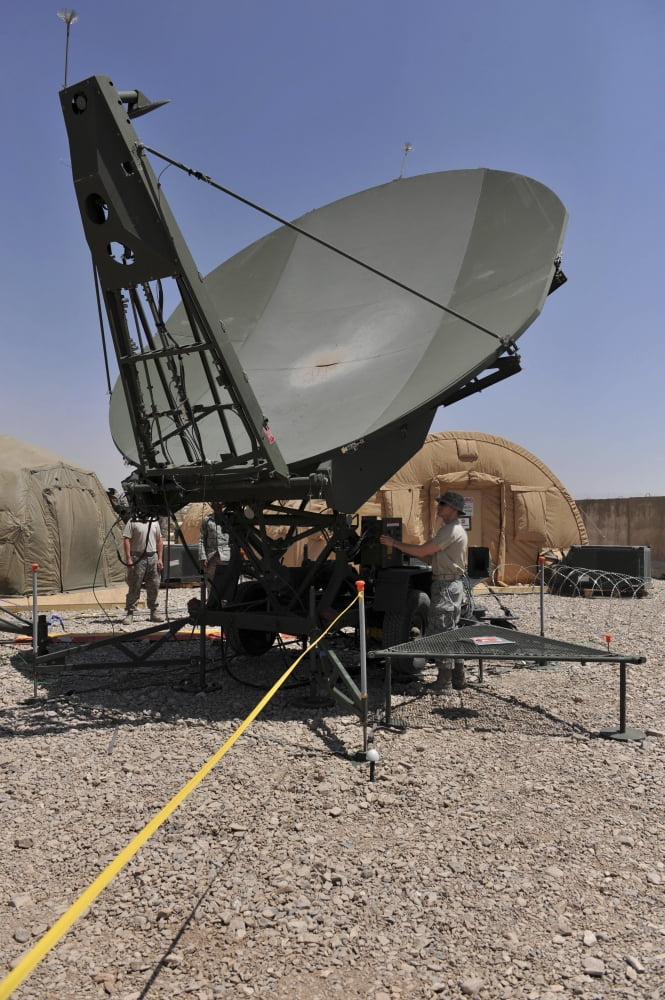 US Air Force member works on a communication satellite dish Canvas Art - Stocktrek Images (23 x 34)
