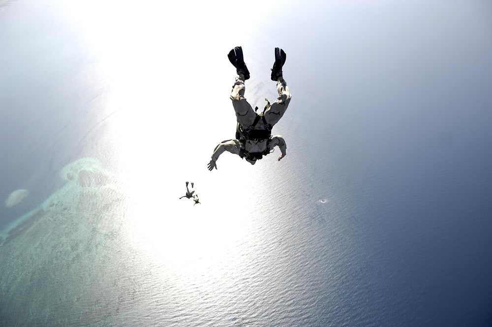 US Air Force pararescuemen conducting a pararescue training jump from an HC-130 Hercules Canvas Art - Stocktrek Images (34 x 23)