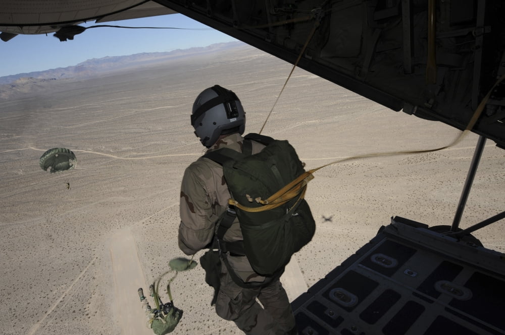 US Air Force pararescuemen jump from a C-130 Hercules Canvas Art - Stocktrek Images (35 x 23)