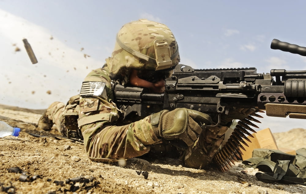 US Air Force soldier fires the Mk48 super SAW machine gun Canvas Art - Stocktrek Images (35 x 23)