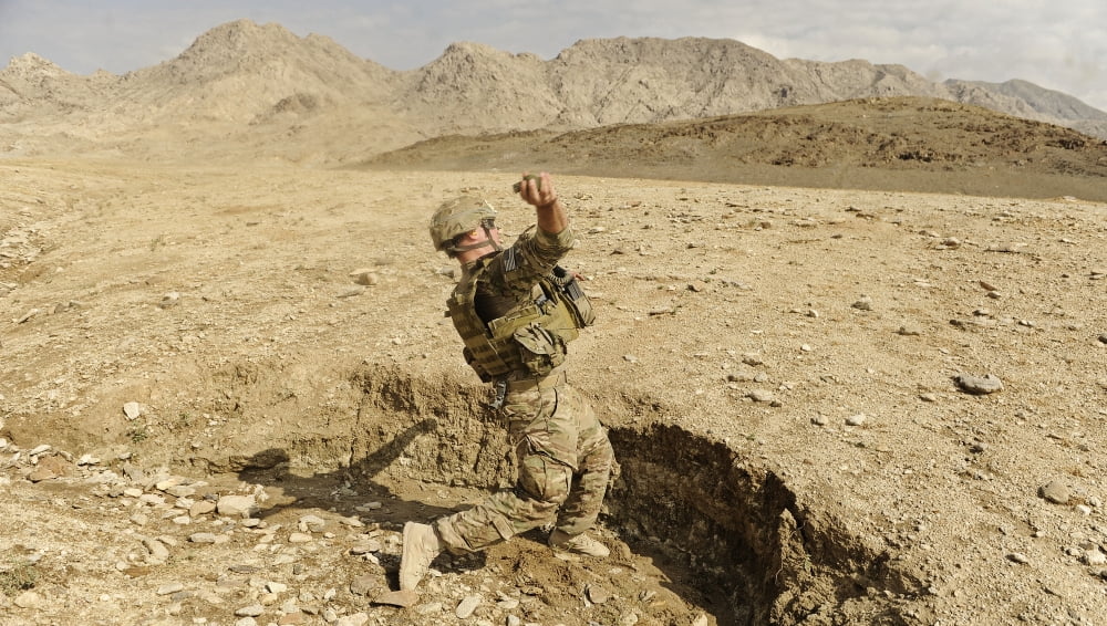 US Air Force soldier throws a frag grenade at the off-base firing range Canvas Art - Stocktrek Images (38 x 21)