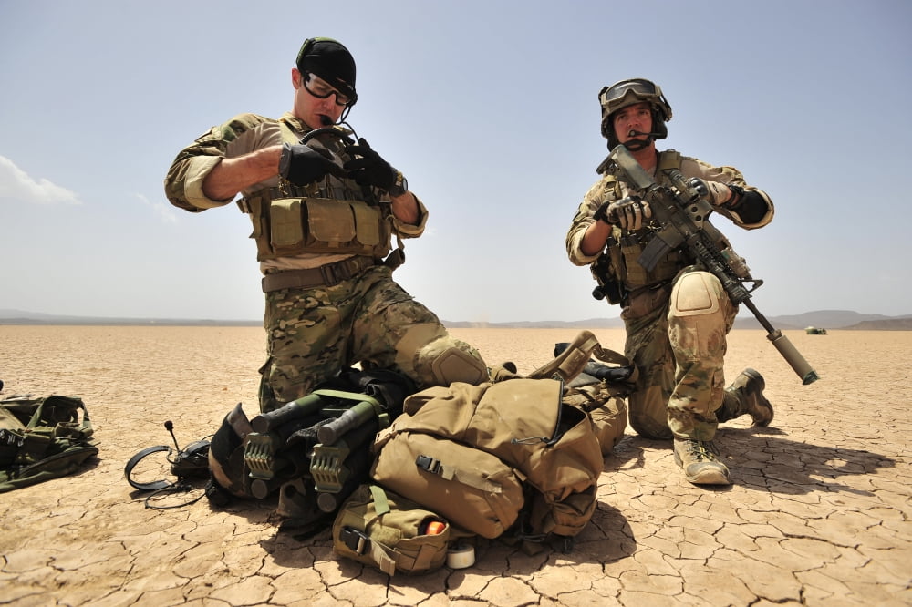 US Air Force soldiers gather their equipment Canvas Art - Stocktrek Images (35 x 24)