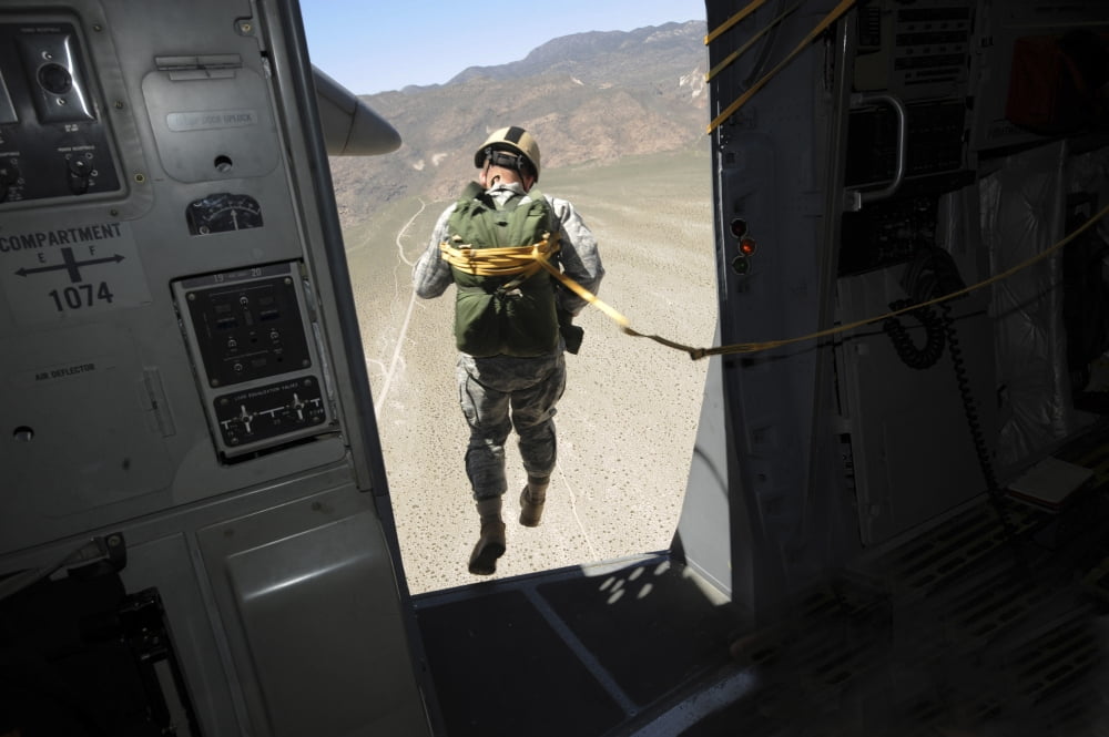 US Airman jumps from a C-17 Globemaster III over Nevada Canvas Art - Stocktrek Images (35 x 23)
