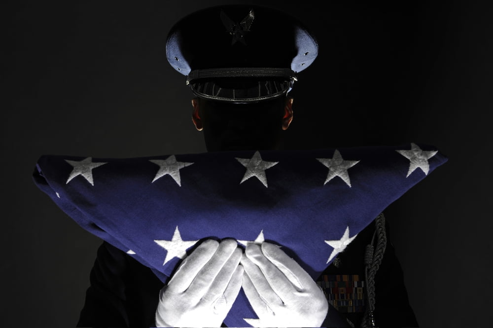 US Airman stands at attention after completing the flag dressing sequence Canvas Art - Stocktrek Images (35 x 23)