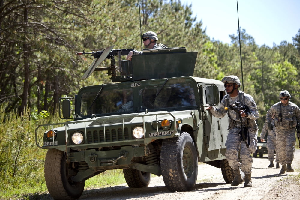 US Airmen advance to an extraction point Canvas Art - Stocktrek Images (34 x 23)