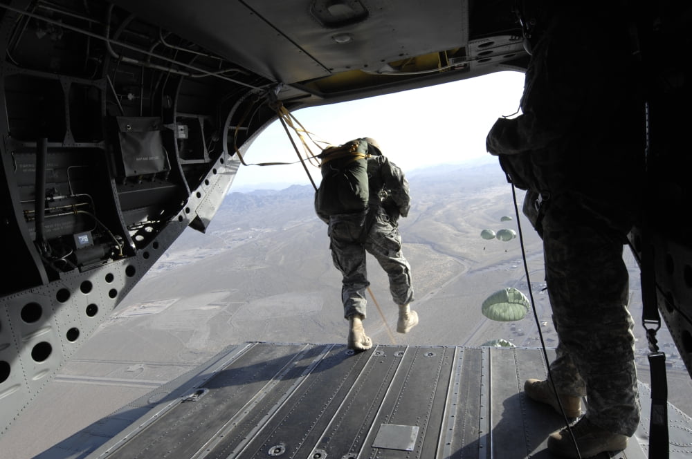 US Airmen jump from a CH-47 Chinook over Nevada Canvas Art - Stocktrek Images (35 x 23)