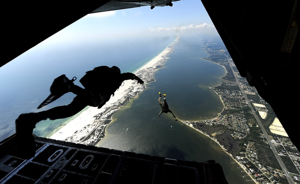 US Airmen jump out of a C-130 Hercules Canvas Art - Stocktrek Images (36 x 22)