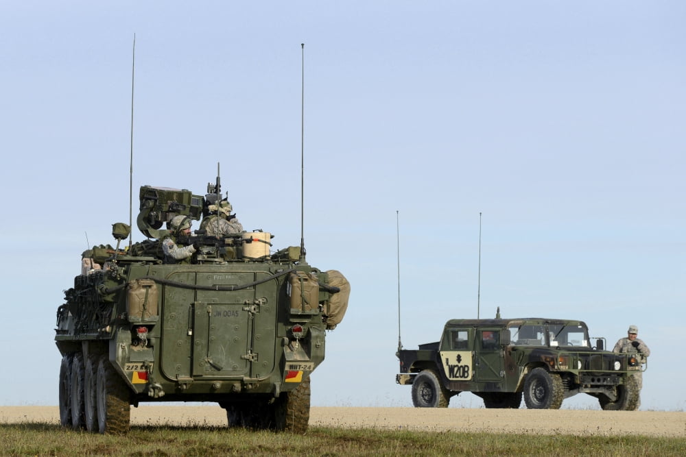 US Army Europe Stryker soldiers aim at targets at the Grafenwoehr Training Area Canvas Art - Stocktrek Images (35 x 23)