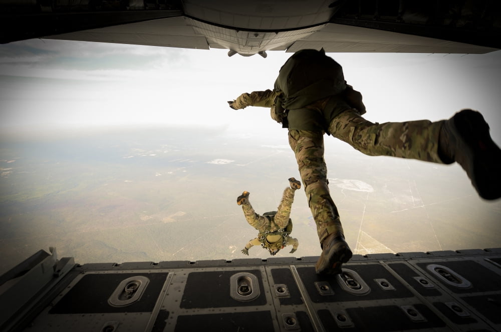 US Army Green Berets jump out of a C-130H3 Hercules over Florida Canvas Art - Stocktrek Images (34 x 23)