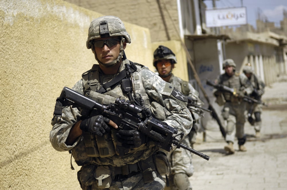 US Army Sergeant leading his squad during a cordon and search in Old Baqubah Iraq Canvas Art - Stocktrek Images (34 x 23)