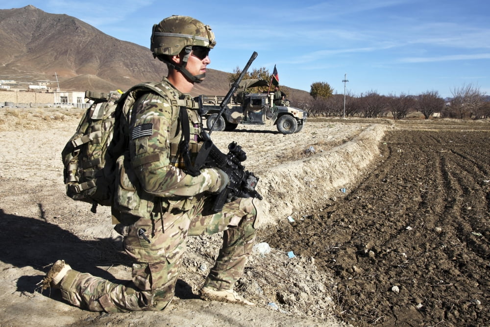 US Army Sergeant provides security during a combat operation in Afghanistan Canvas Art - Stocktrek Images (35 x 23)