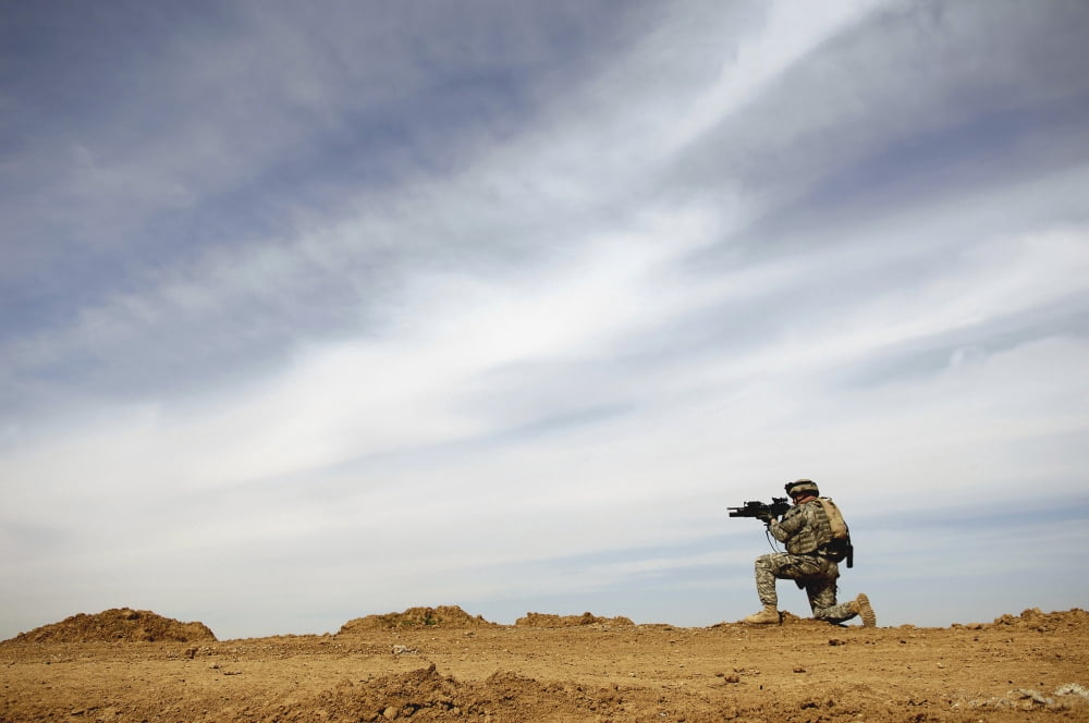 US Army Sergeant provides security during a patrol in Iraq Canvas Art - Stocktrek Images (34 x 23)