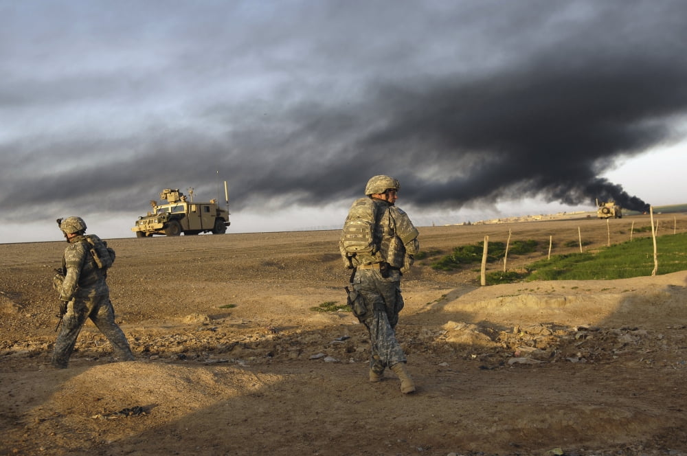 US Army Sergeants walk to the rally point to link up with the Iraqi army soldiers Canvas Art - Stocktrek Images (34 x 23)