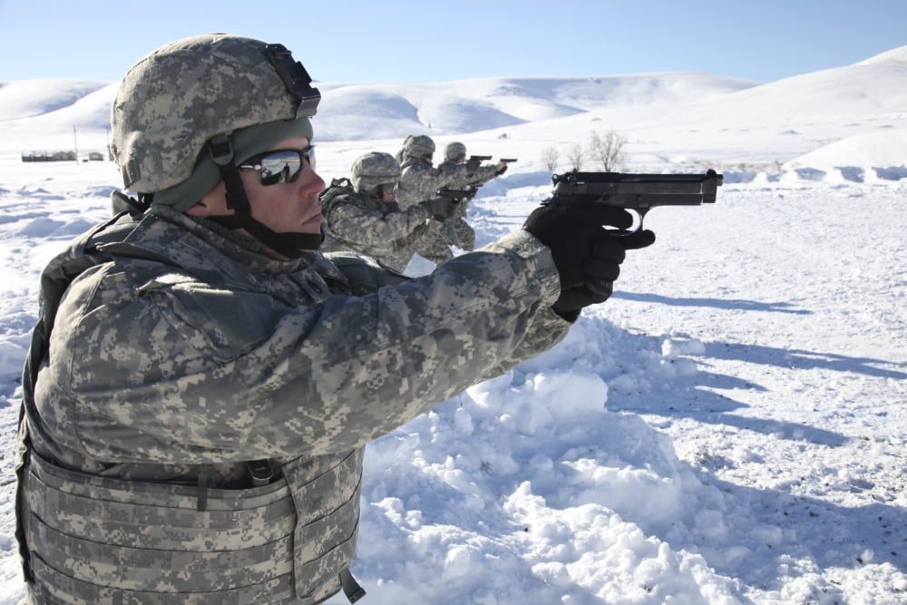 US Army Soldier fires a 9mm Berretta pistol Canvas Art - Stocktrek Images (34 x 23)