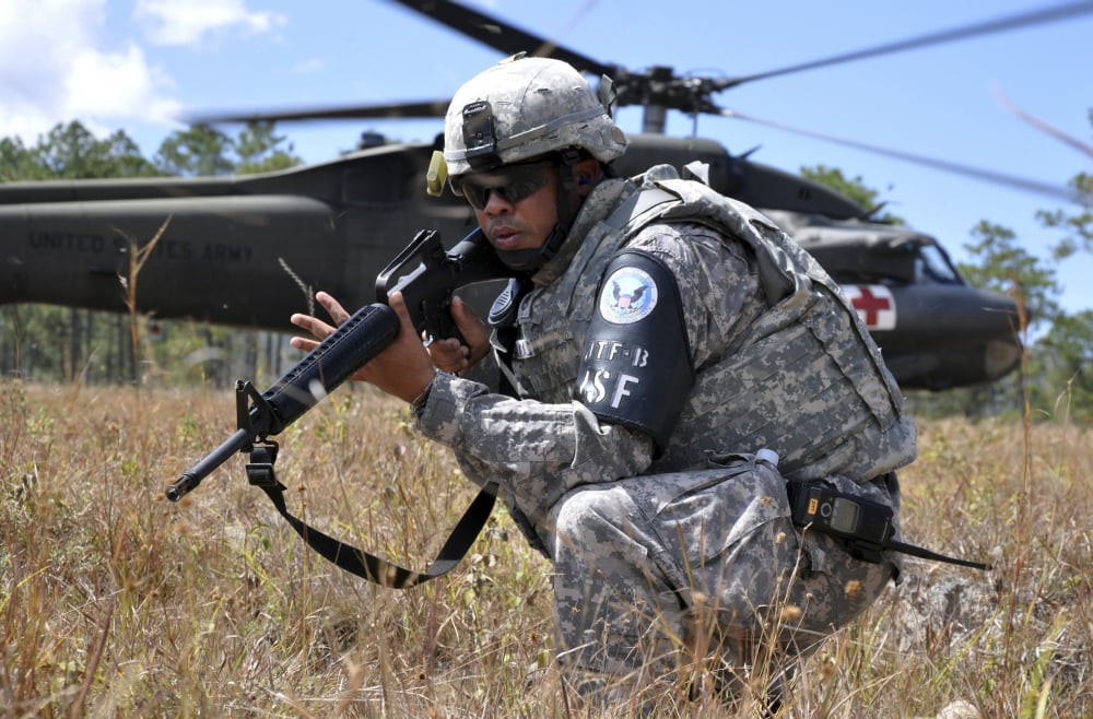 US Army Soldier provides security during a medical evacuation Canvas Art - Stocktrek Images (34 x 23)