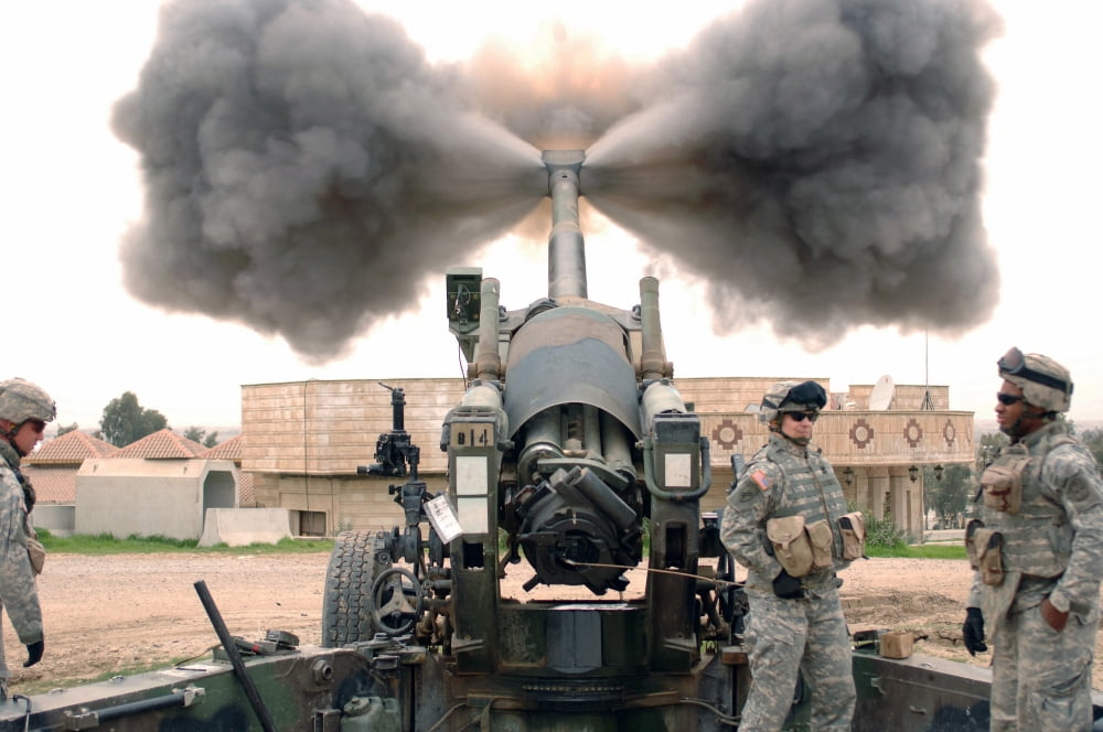 US Army Soldiers conduct a calibration fire of a M198 Howitzer Canvas Art - Stocktrek Images (34 x 23)