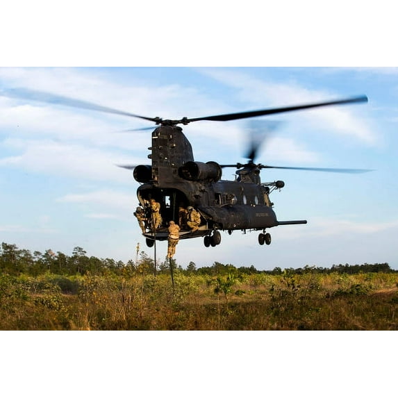 US Army Soldiers fast-rope out of a CH-47 Chinook Poster Print by Stocktrek Images (17 x 11)