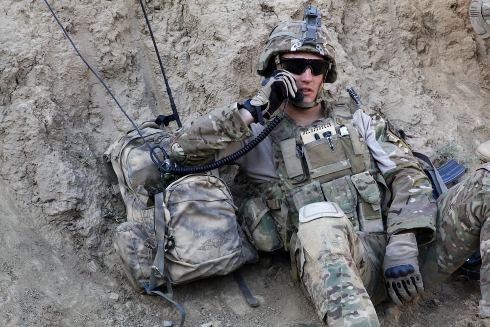 US Army Specialist conducts a radio check Canvas Art - Stocktrek Images (34 x 23)