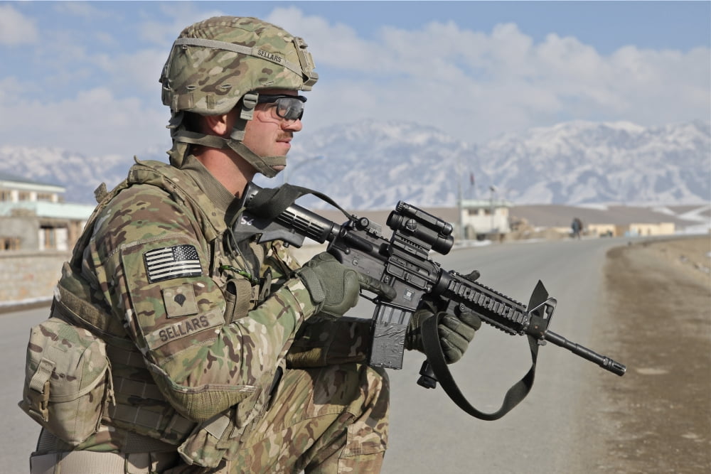 US Army Specialist provides security during a convoy stop in Afghanistan Canvas Art - Stocktrek Images (35 x 23)