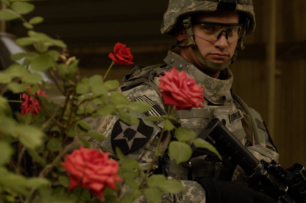 US Army Specialist provides security during a joint foot patrol Canvas Art - Stocktrek Images (34 x 23)