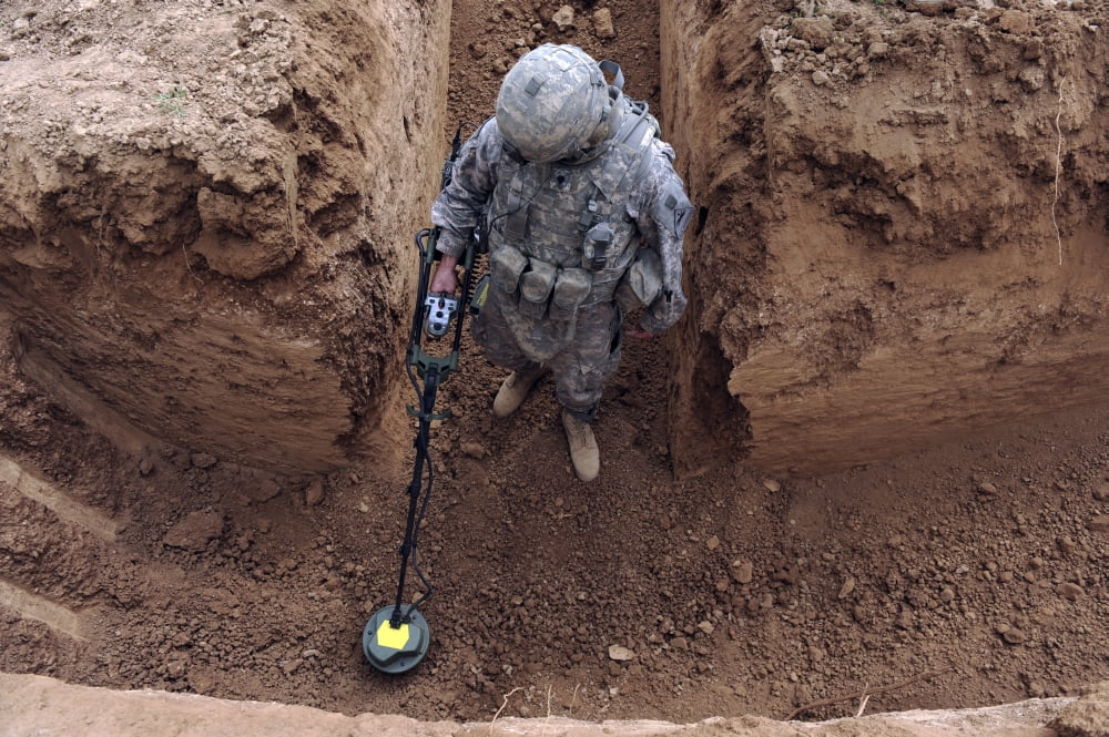 US Army Specialist searches for a weapons cache in Kirkuk Iraq Canvas Art - Stocktrek Images (34 x 23)
