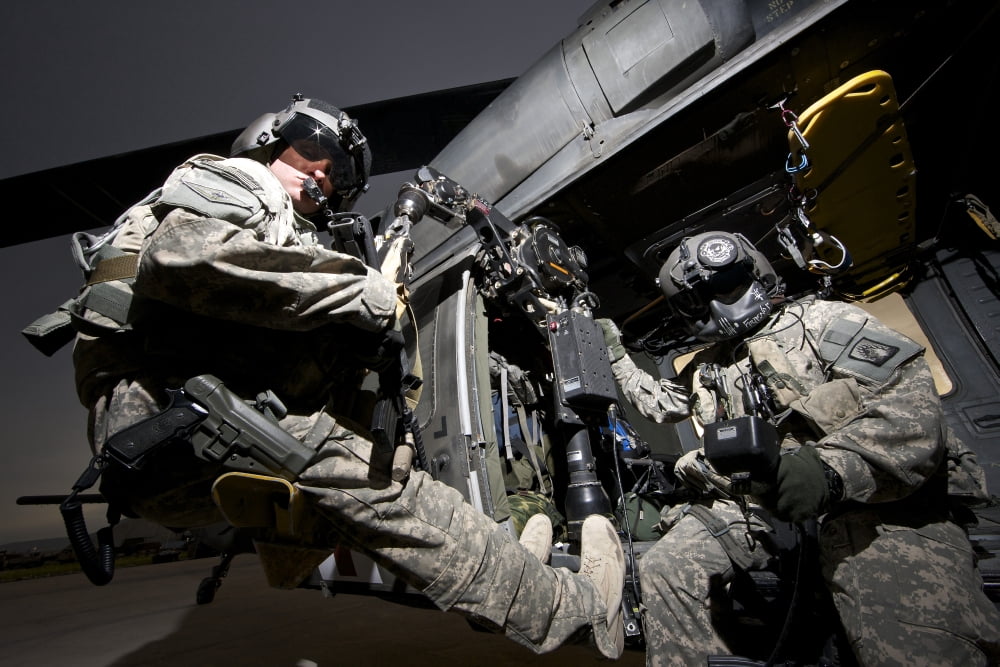 US Army crew strapped into the medevac hoist of a UH-60L Black Hawk Canvas Art - Terry MooreStocktrek Images (35 x 24)